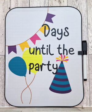 Whiteboard with party hats and balloons with the text "days until the party"