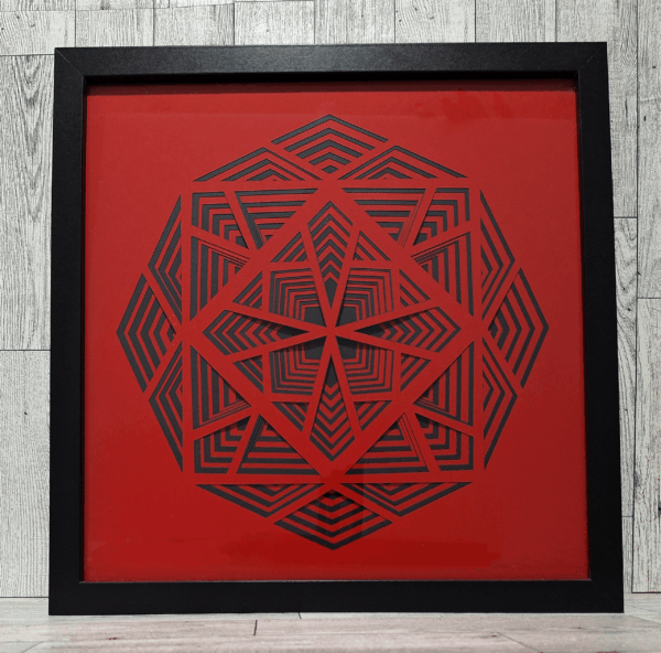 Black and red geometric design layered paper art