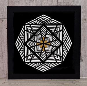 Layered black and white paper in a geometric design in black frame