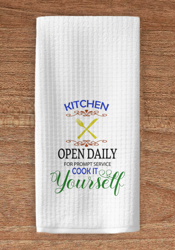 Kitchen towel imprinted with Kitch Open Daily... cook it yourself