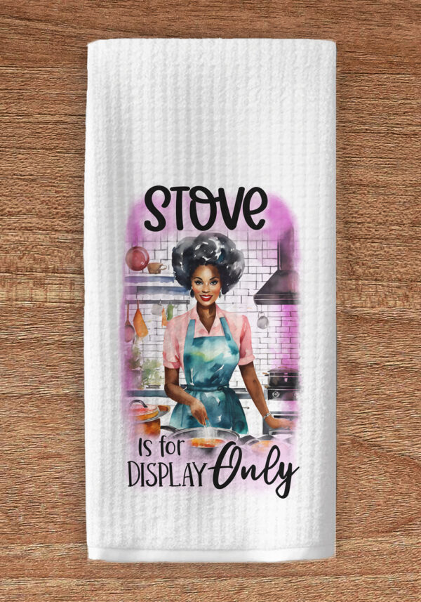 Towel imprinted with vintage housewife and the title text